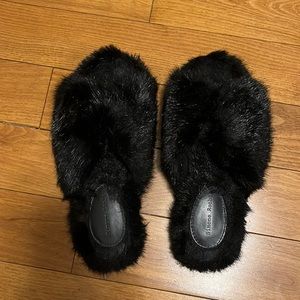 Simone Rocha slides in black faux fur